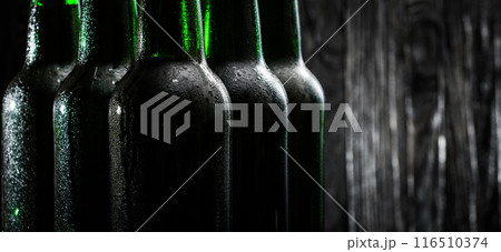 Green beer bottles 116510374