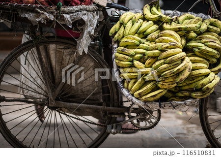bananas on a bike on a street bananas on a bike on a street 116510831