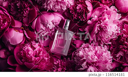 Perfume bottle with beautiful flowers. Floral background. Beauty concept. Flat lay, top view. 116514181