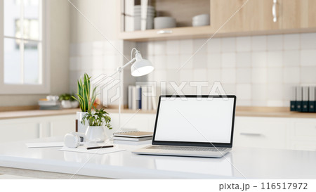 A laptop computer mockups on a modern white kitchen island in a minimalist white kitchen. 116517972