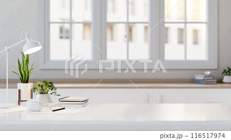 A copy space for displaying products on a white tabletop with accessories in a minimal white kitchen 116517974