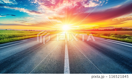 An empty highway at sunset with a dramatic sky full of sunlight ray 116521845