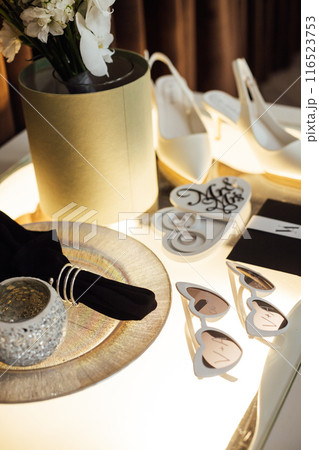 Wedding invitations. Wedding details of the bride. Bridal bouquet and other accessories. Shoes of the bride Wedding invitations. Wedding details of the bride. Bridal bouquet and other accessories. Shoes of the bride 116523753