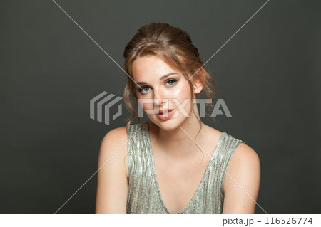 Fashionable elegance woman with fresh skin, updo hair and makeup on white background Fashionable elegance woman with fresh skin, updo hair and makeup on white background 116526774