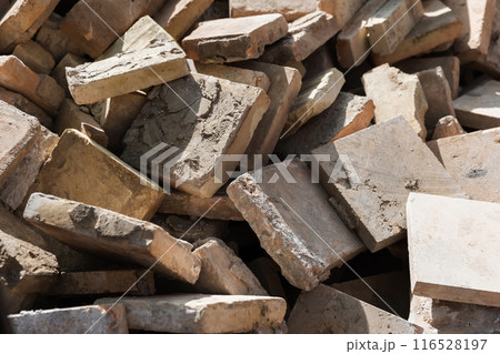 Heap of old square liles after dismantling, close up photo 116528197