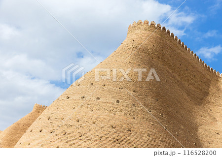 Ark of Bukhara is under blue sky on a sunny summer day. Uzbekistan Ark of Bukhara is under blue sky on a sunny summer day. Uzbekistan 116528200