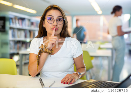 Young female Latina student tricky hush 116529736