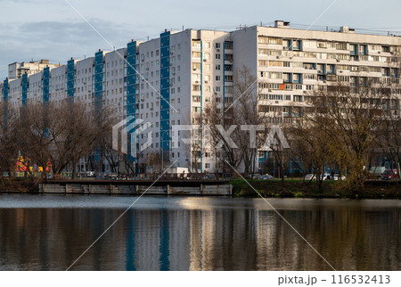 Multi-storey residential complex on the river bank in a residential area Multi-storey residential complex on the river bank in a residential area 116532413
