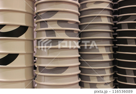 Painted paper cups lined up in columns arranged by color for coffee of different strengths Painted paper cups lined up in columns arranged by color for coffee of different strengths 116536089