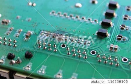 Closeup View Of Melted Pins On A Blown Circuit Board Closeup View Of Melted Pins On A Blown Circuit Board 116536106