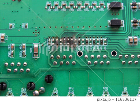 Electronic board with numbered burnt out silver pins texture background Electronic board with numbered burnt out silver pins texture background 116536117