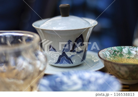 Traditional chinese porcelain teapot and cups on the table 116538813
