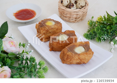 tofu filled with delicious quail eggs 116539934