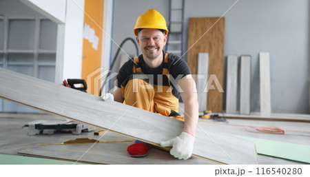 Professional master overalls making new laminated floor 116540280