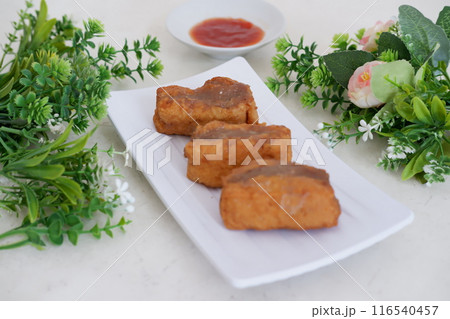 Spicy fried tofu filled with meat 116540457