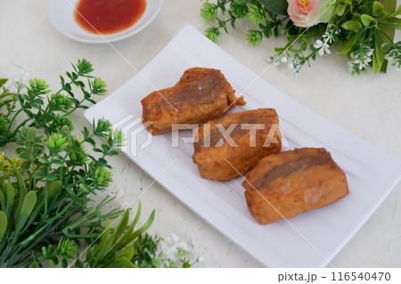 Spicy fried tofu filled with meat 116540470