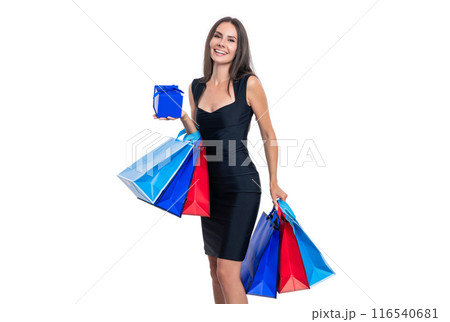 photo of smiling shopping woman with shop bags. shopping woman isolated on white photo of smiling shopping woman with shop bags. shopping woman isolated on white 116540681