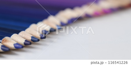 Set of blue identical pencils lie in raw Set of blue identical pencils lie in raw 116541226