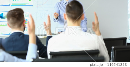 Business coach at training in company office, development strategy, teambuilding or brainstorming Business coach at training in company office, development strategy, teambuilding or brainstorming 116541238