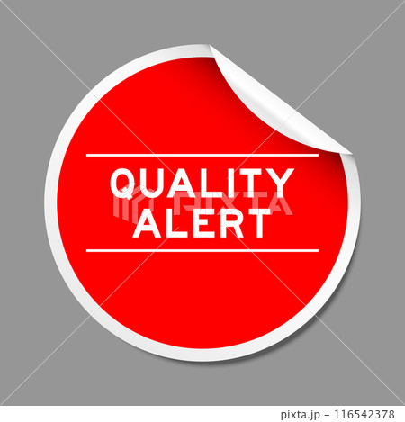 Red color peel sticker label with word quality alert on gray background Red color peel sticker label with word quality alert on gray background 116542378