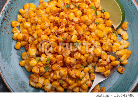Esquites mexican street corn salad with chili, cilantro and lime juice Esquites mexican street corn salad with chili, cilantro and lime juice 116542496