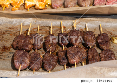 Small Skewers, Street Barbecue, Chicken Shish Kebab, Barbecue Shashlik, Skewered Grilled Meat Pieces Small Skewers, Street Barbecue, Chicken Shish Kebab, Barbecue Shashlik, Skewered Grilled Meat Pieces 116544931