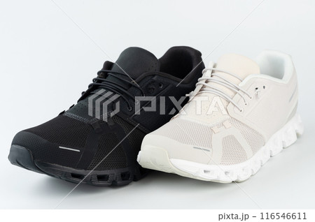 Pair of white nad black sport shoes 116546611