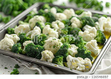 A Symphony of Greens and Whites: Broccoli and Cauliflower Roasting in a Silver Pan 116546897