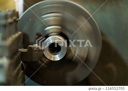 Close up shoot showing a drilling - lathing machine in operating. 116552705