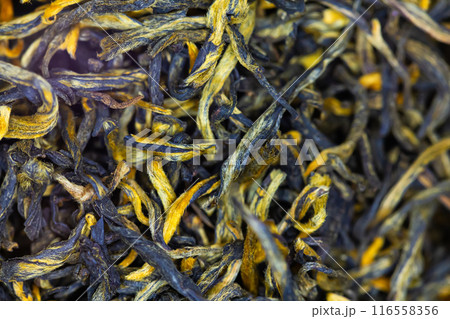 Close-up view of loose leaf black tea. Close-up view of loose leaf black tea. 116558356