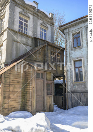 Decorations of building in Moscow, 19 century Russia with wooden door and windows, at a film studio 116559073