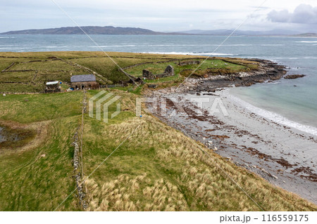 Aerial view of the Inishkeel island during a misty and hazy winter day - Portnoo, County Donegal, Ireland Aerial view of the Inishkeel island during a misty and hazy winter day - Portnoo, County Donegal, Ireland 116559175