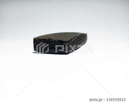 Dark brown wafer on isolated white background  116559912