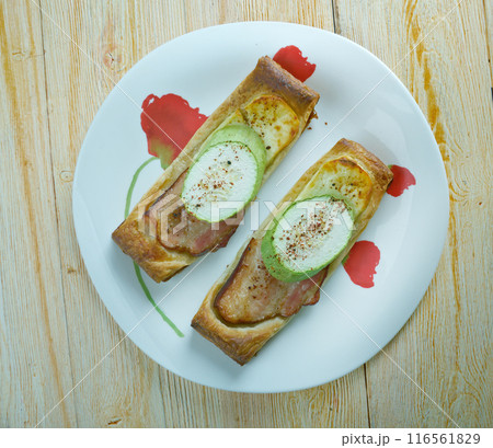 Pastry tart bacon cheese and zucchini 116561829