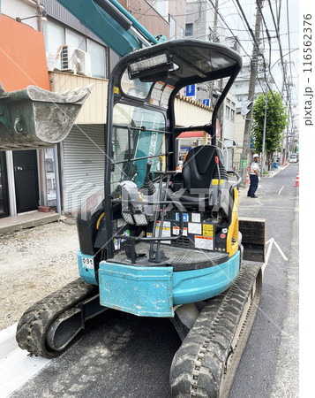 Yokohama, Kanagawa, Japan, June 25, 2024, An excavator digs ground near at city in Japan Yokohama, Kanagawa, Japan, June 25, 2024, An excavator digs ground near at city in Japan 116562376