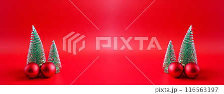 Christmas tree and baubles on red background new year  holiday celebration concept 116563197