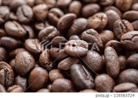 Fresh roasted brown coffee beans background Fresh roasted brown coffee beans background 116563724