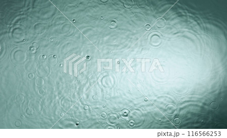 Freeze motion of splashing water drops on on light blue background 116566253