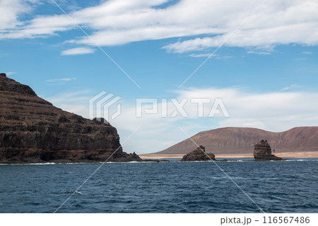Coastal rocks on the north of Lanzarote, Spain 116567486
