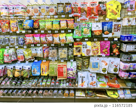 Snacks Display On Shelf At A Convenience Store. Snacks Display On Shelf At A Convenience Store. 116572185