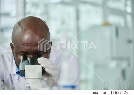 Clinician studying new virus or variant Clinician studying new virus or variant 116574262