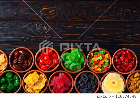 Group of dried and candied fruit in bowl Group of dried and candied fruit in bowl 116574549