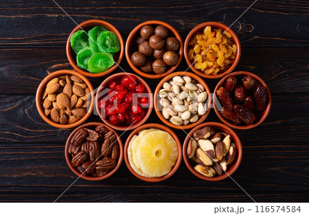 Mix of dried and candied fruits and nuts 116574584