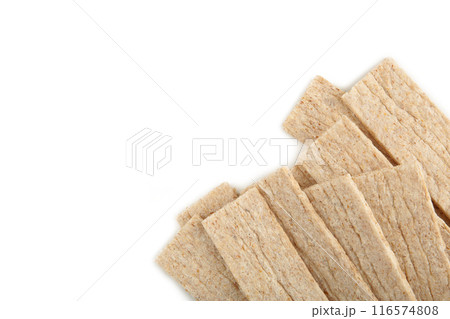 A slices of wheat crispbread isolated on white background. 116574808