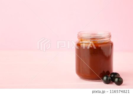 Jars of baby puree on pink background with copy space Jars of baby puree on pink background with copy space 116574821