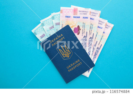 Ukrainian passport and money. Biometric passport of a citizen of Ukraine and 200, 1000 banknote. Ukrainian passport and money. Biometric passport of a citizen of Ukraine and 200, 1000 banknote. 116574884
