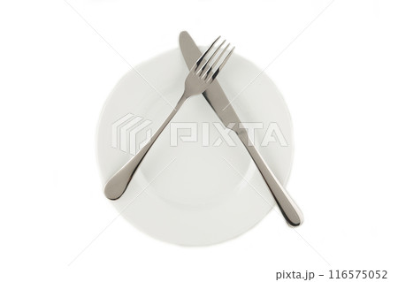 Dining etiquette - I still eat, pause. Fork and knife signals with location of cutlery set. Photo illustration isolated on white background. Set of foto 4 from 7 Dining etiquette - I still eat, pause. Fork and knife signals with location of cutlery set. Photo illustration isolated on white background. Set of foto 4 from 7 116575052