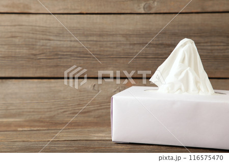 Tissue box on grey background. Top view Tissue box on grey background. Top view 116575470