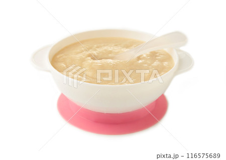 Baby porridge on plate isolated on white background Baby porridge on plate isolated on white background 116575689