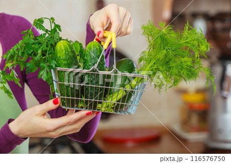 Green vegetables in shopping basket Green vegetables in shopping basket 116576750